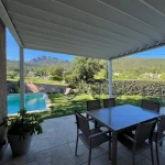 Pérgola retráctil SIROCO 4,50×4,109 m Motorizado con mando a distancia (Blanco RAL 9010) - Imagen 3